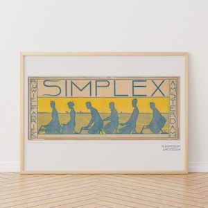 May include: Framed vintage poster featuring cyclists in blue against a yellow backdrop. The word "SIMPLEX" is central, with Dutch text and "RIJKSMUSEUM AMSTERDAM". The poster is in a wooden frame.