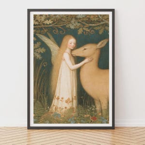 May include: A framed art print depicting a long-haired figure with translucent wings wearing a cream-coloured dress with floral patterns, standing in a forest setting and gently touching the head of a tan deer among green ferns and dark foliage.