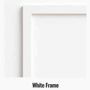 May include: A close-up of a white picture frame with a clean, modern design. The frame is a bright white color and has a simple, rectangular shape. The text "White Frame" and "A clean white framing option" are at the bottom.