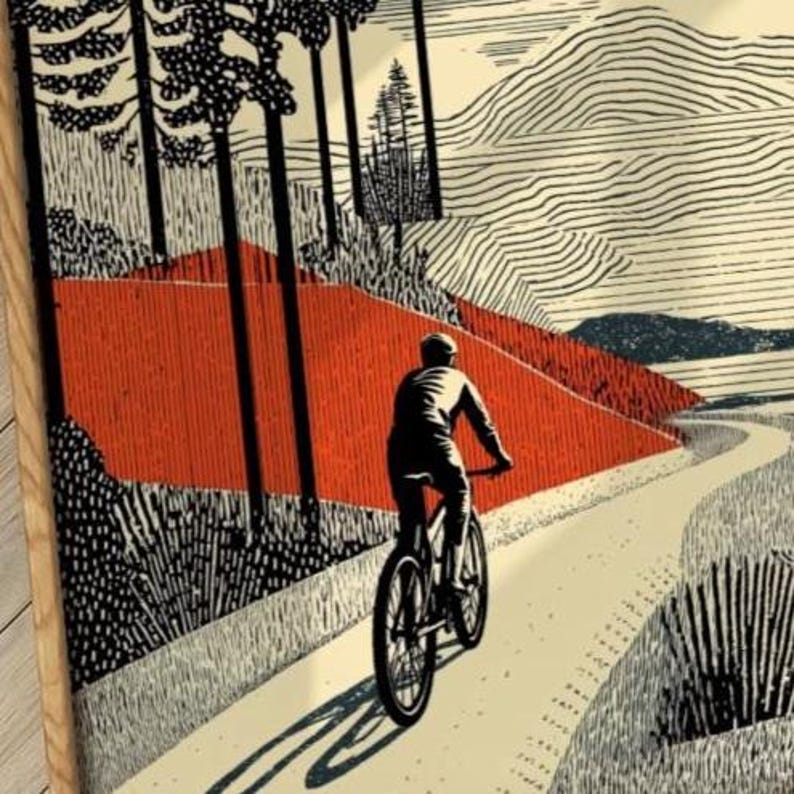 May include: An artistic print depicts a cyclist riding on a winding path through a landscape. The artwork features a color palette of red, black, and cream, with stylized trees and mountains in the background. The cyclist is in silhouette.