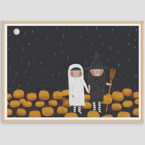 May include: A framed Halloween print showing two costumed figures. One is a ghost in white, the other a witch in black. They stand in a field of pumpkins under a dark, starry sky. A full moon is visible in the artwork.