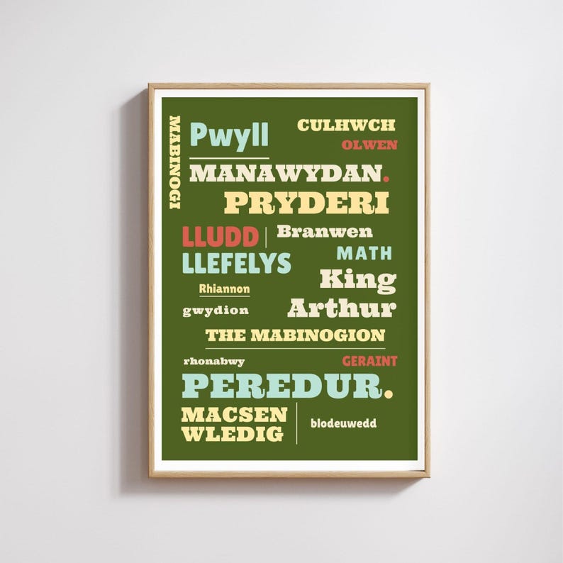 May include: A framed print featuring text from the Mabinogion, a collection of Welsh tales. The text is in various colors, including green, red, and yellow, against a dark green background. The print is in a wooden frame.