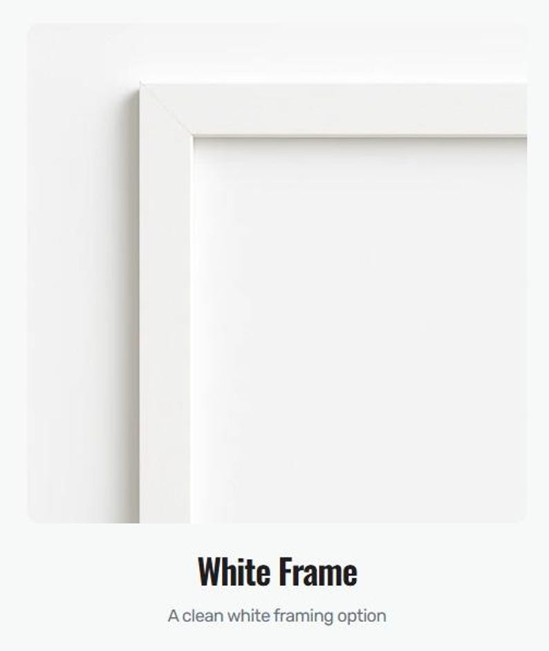 May include: A close-up of a white picture frame with a clean, modern design. The frame is a bright white color and has a simple, rectangular shape. The text "White Frame" is displayed below the frame.