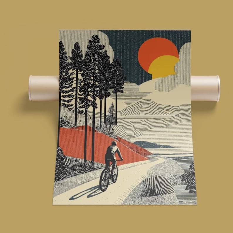May include: An art print depicting a cyclist on a winding path, with a red and orange sunset in the background. The print features tall trees, rolling hills, and a textured style, creating a scenic landscape. The print is rolled up and held by a beige tube.