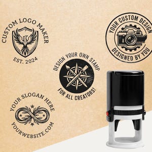 May include: A black and white self-inking stamp with a white base, next to several circular logo designs. The logos include a phoenix, a camera, an infinity symbol, and text that reads "Custom Logo Maker" and "Design Your Own Stamp".