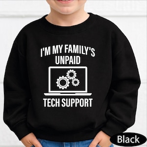 May include: A white ceramic mug with a black handle and the text "But First, Coffee" in a bold, black font. The mug is sitting on a wooden surface. The mug is approximately 4 inches tall.