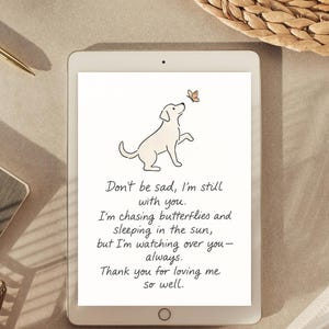 May include: A digital tablet displays a line drawing of a dog looking up at a butterfly. Text on the screen reads, "Don't be sad, I'm still with you...Thank you for loving me so well."