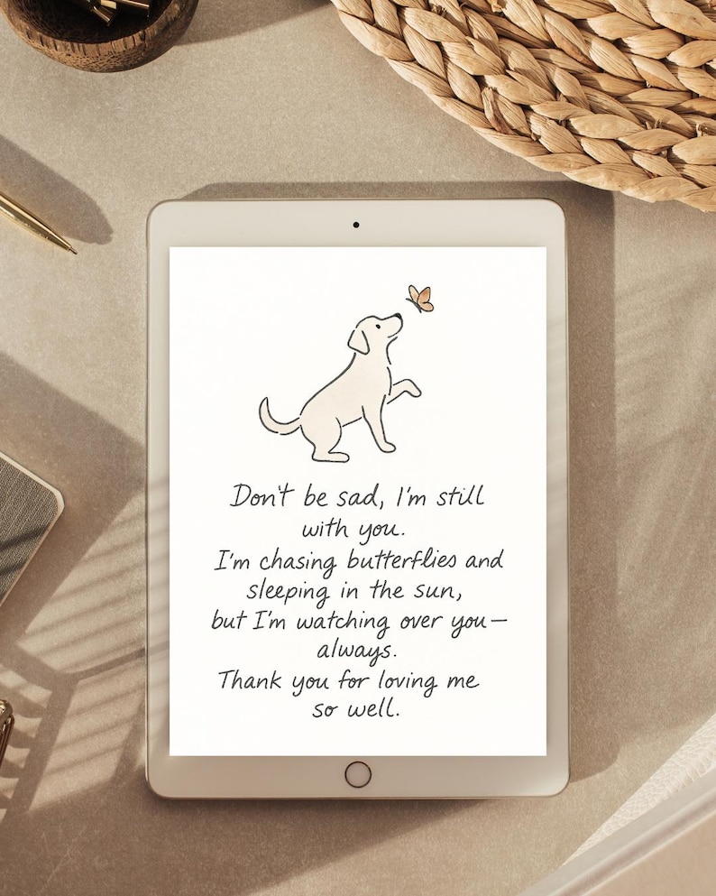 May include: A digital tablet displays a line drawing of a dog looking up at a butterfly. Text on the screen reads, "Don't be sad, I'm still with you...Thank you for loving me so well."