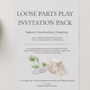 May include: A white printable classroom resource titled "LOOSE PARTS PLAY INVITATION PACK." The text includes "Nature | Construction | Creativity" and a description of open-ended learning environments. The image features watercolor illustrations of stones, a seashell, and stacked blocks.