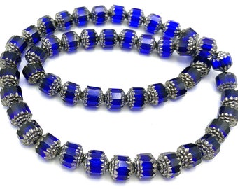 16 cobalt blue 6mm cathedral beads, Czech glass, blue and metallic silver
