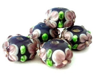 5 purple flowered beads, floral lampwork, 15mm to 18mm plum purple glass rondelles with raised flowers