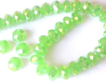 30 iridescent 6mm light green crystal beads, 6mm x 4mm