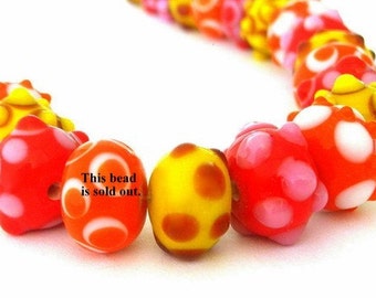 6 red, orange, yellow and brown lampwork glass bumpy beads, 13-15mm x 10mm rondelles with raised polka dots