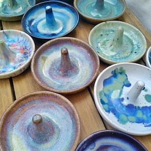 May include: A rustic wooden sign with the text "Welcome to our home" in a handwritten style. The sign features a distressed finish and a simple, inviting design, perfect for a front porch or entryway.