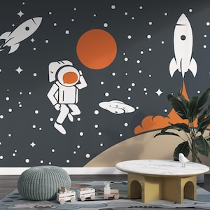 Carta da parati con razzi, luna e astronauti: murale retrò in stile spaziale con design galattico futuristico per stanze avventurose