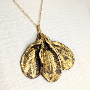 Collana con ciondolo in cartapesta