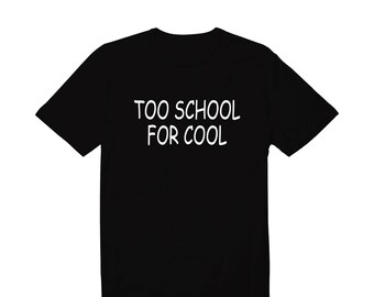 May include: Black t-shirt with the white text "TOO SCHOOL FOR COOL" across the chest. The shirt has short sleeves and a crew neck. A casual, everyday wear item.