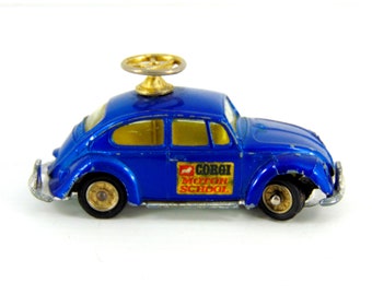 toy car with steering wheel on roof