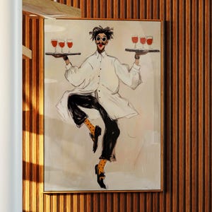 May include: A framed artwork depicts a whimsical figure balancing trays of wine glasses. The figure is dressed in a white coat, black pants, and yellow socks. The artwork hangs on a wood-paneled wall, near a spiral staircase.