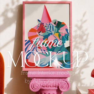 May include: A rectangular pink picture frame containing a colorful illustration of a tiger wearing a pink party hat. The frame is displayed on a pink fluted pedestal. The text "frame MOCKUP" is overlaid in white across the center of the image.
