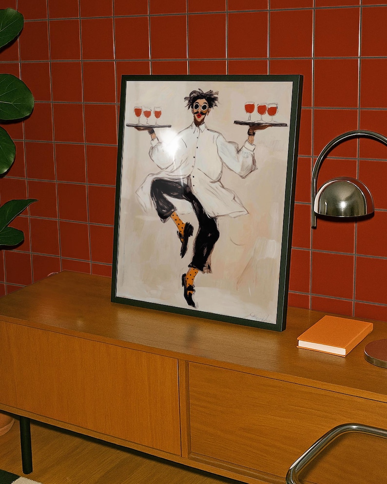 Playful illustrated waiter character dancing while holding trays of red wine glasses, wearing an oversized white coat, round goggles, red lips, and polka dot socks. This whimsical fashion-style artwork combines humor, wine culture, and expressive illustration, making it a perfect statement piece for kitchens, dining rooms, wine bars, cafes, and eclectic modern interiors.Whimsical Waiter Print: Dancing Sommelier Poster, Wine Lover Wall Art, Playful Fashion Character Decor, Modern Eclectic Home