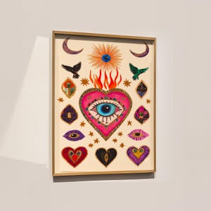 A vibrant mystical poster featuring a flaming heart with a central blue evil eye surrounded by celestial symbols, stars, moons, and birds. Embellished with jewel-like details and bright colors, this maximalist artwork blends folk art and spiritual symbolism, making it a bold bohemian wall decor piece.Mystical Eye Art, Spiritual Decor, Celestial Folk Print, Bohemian Wall Art, Protective Eye Print, Dopamine Decor, Maximalist Art, Sacred Heart Art, Colorful Mystical Decor, Eclectic Spiritual Print