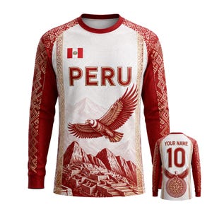 Op de afbeelding: Een shirt met lange mouwen met een wit voorpand met de tekst PERU, een Peruaanse vlag, een vliegende adelaar en een berglandschap. De mouwen zijn rood met geometrische patronen. De achterkant toont de tekst YOUR NAME en het nummer 10.