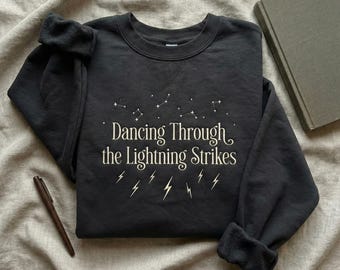 Dancing Through the Lightning Strikes Embroidered Sweatshirt, Orange Girl Crewneck, Concert Outfit Shirt, Inspirational Quote Sweater