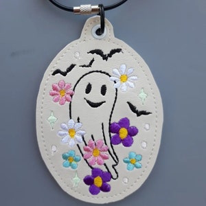 Embroidered ghost oval bag tag image 1