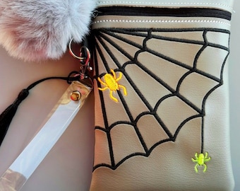 Embroidered vinyl - Spiderweb wristlet purse