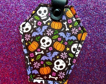 Coffin shaped Vinyl Keychain - Pumpkins Skulls and Bats