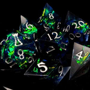 Sparks in the Dark - Sharp Edge Resin D&D Dice Set