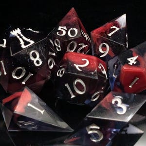 Red Nebula - Sharp Edge Resin D&D Dice Set