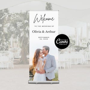 May include: A white wedding welcome sign with the text "Welcome" in elegant script. The sign includes the names "Olivia & Arthur" and the date "September 10, 2025". A photo of the couple is featured below the text. The sign is a Canva template.