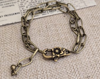 Chunky Antiqued Brass Paperclip Chain Bracelet with Floral Oversized Lobster Clasp