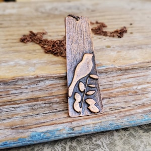 Lange boho-koperen ketting met vogelhanger: matte mussieraden