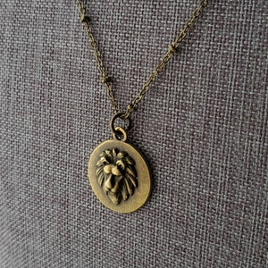 Antiqued Brass Lion Pendant Necklace: Minimalist Aslan Medallion