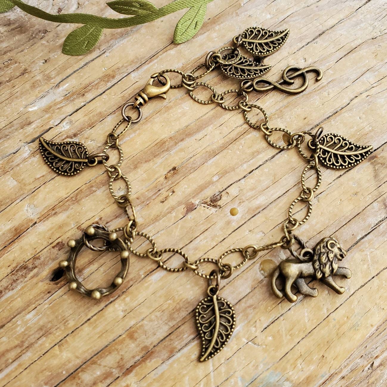 Bronze charm best sale bracelet