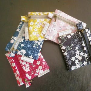 Custodia per AirPods con motivo a fiori di ciliegio giapponese - Mini astuccio con cerniera - Piccolo portachiavi con portamonete