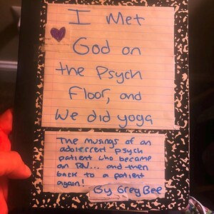 Puede incluir: Un cuaderno en blanco y negro con texto manuscrito en tinta azul. El texto dice "I Met God on the Psych Floor, and We did yoga." Debajo, dice "The musings of an adolescent psych patient who became an RN... and then back to a patient again!"