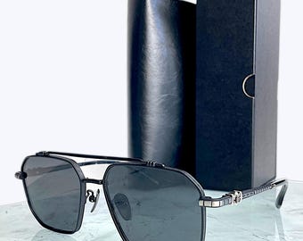 Gafas de sol Titanium Gothic: gafas de diseño unisex con lentes oscuras UV400