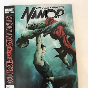 May include: A comic book cover featuring a man with a black shirt and red cape fighting a green monster. The cover is titled "Curse of the Mutants" and "The First Mutant Namor".