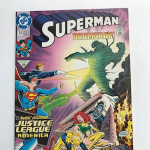 May include: A vintage Superman comic book cover depicting Superman in a fight with Doomsday. The cover art includes the Justice League America and the text "Doomsday!" in large letters. The comic is dated 1992.