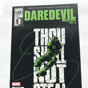 May include: Daredevil comic book cover featuring a green and black illustration of Daredevil with the text "Thou Shalt Not Steal" and "Decalogue Part IV".