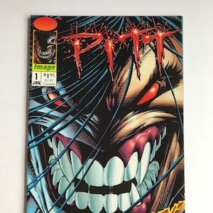 May include: Comic book cover featuring a close-up of a monstrous face with sharp teeth and red eyes. The title "PITT" is in red, dripping letters. The cover also includes the text "RIPPING! 1st ISSUE!" and the Image Comics logo.