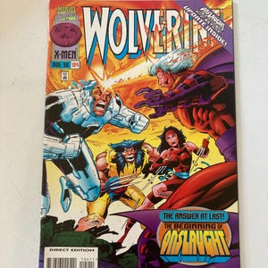 May include: A comic book cover for Wolverine, featuring action-packed illustrations of X-Men characters. The cover has the text "Wolverine" in large letters, with the issue number and date visible. The comic book is a direct edition.