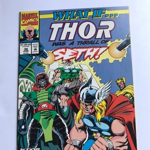 Puede incluir: Una portada de cómic con Thor, el dios nórdico del trueno, con un traje azul y rojo. La portada se titula "What If... Thor Was A Thrall Of Seth!" y presenta un logotipo del 30 aniversario. La portada también presenta el texto "Timequake Part Four Of Five".
