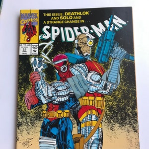May include: A Spider-Man comic book cover featuring Deathlok and Solo. The cover has a black background with the title "SPIDER-MAN" in white. The comic book is labeled "REVENGE OF THE SINISTER SIX PART FOUR".