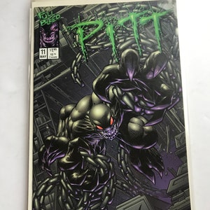 May include: A comic book cover featuring a black and green monster with red eyes and sharp teeth. The monster is chained and appears to be breaking free. The title of the comic is "Pitt" and the issue number is 11.