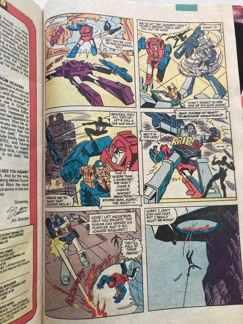 May include: Comic book page featuring Transformers and Spider-Man. Panels depict robot characters in action, with speech bubbles and dynamic illustrations. The comic is from the 1970s.